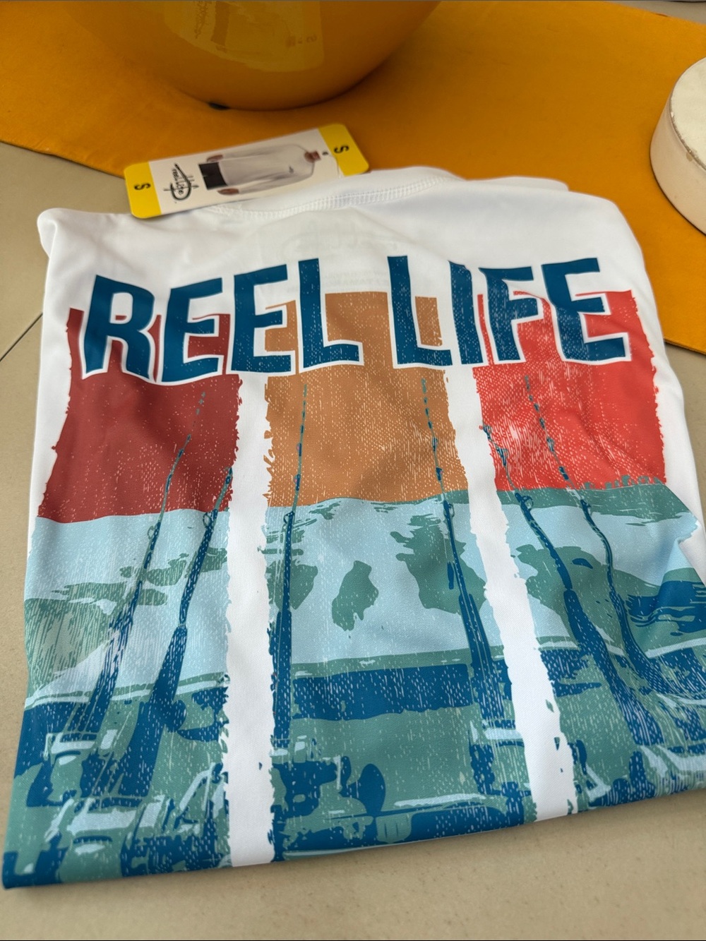 REEL LIFE Graphic Tee in Teal, Red & Brown